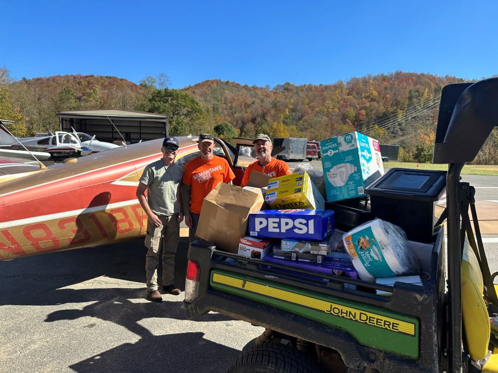 Nick Reyzin and volunteers unpacking hurricane relief supplies