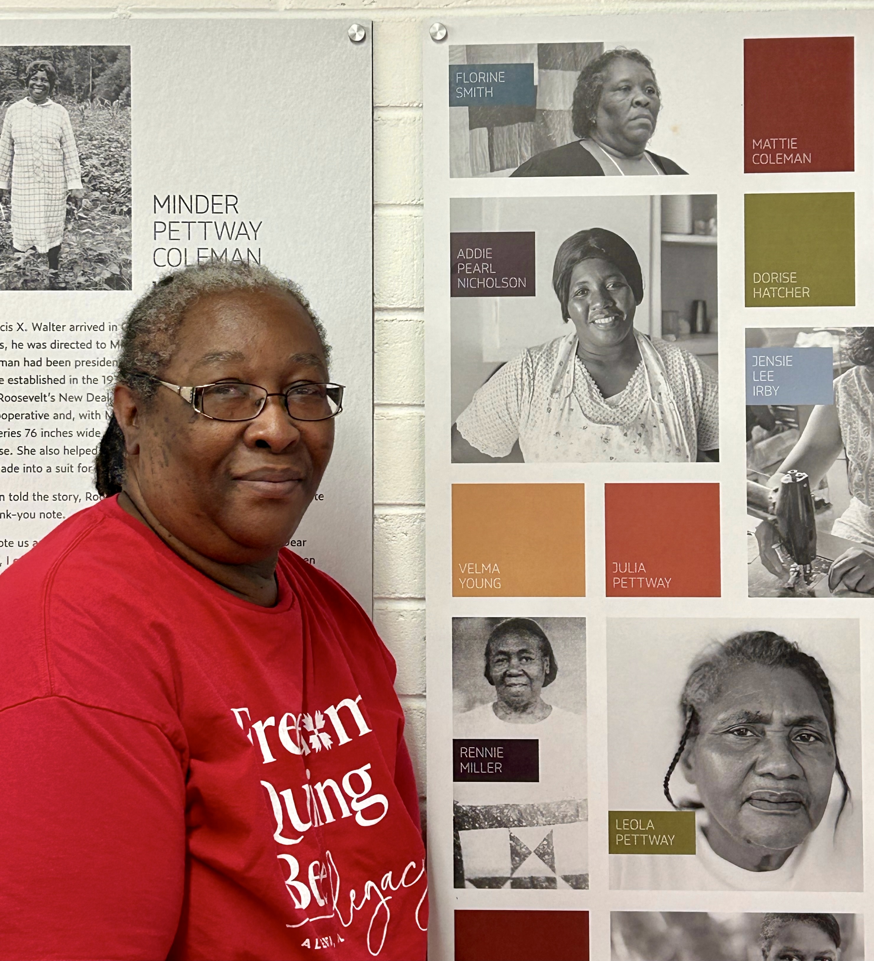 Shelia Smith stands next to a photo of her mother, Florine Smith, at the memorial wall during the Freedom Quilting Bee Exhibit.