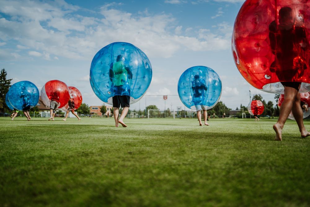People in bubbles playing 