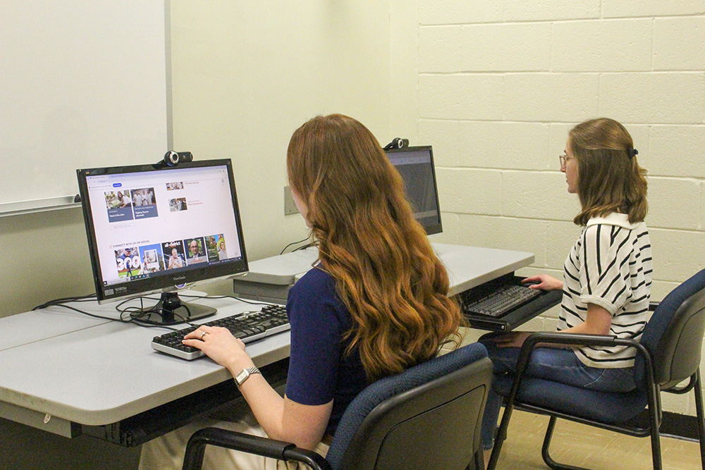 An image of users sitting at computers during a usability test in the LUCIA lab.