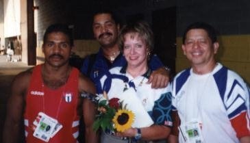 Susan Melton with gold medal winners from Cuba at the 1996 Olympics