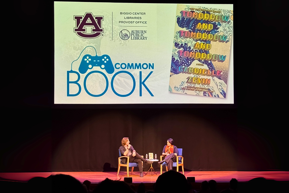 Matthew Mercer and Emily Friedman speaking on stage