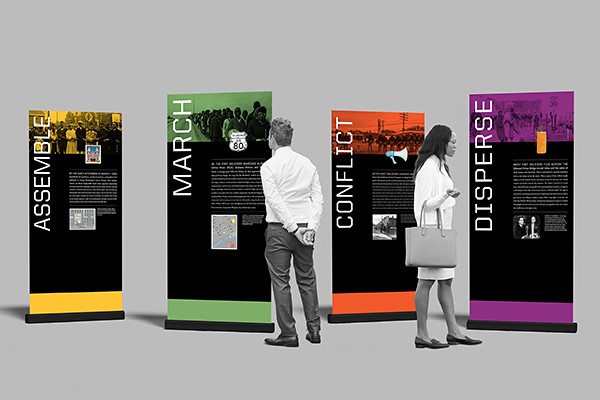 People look at a Selma Bloody Sunday research display