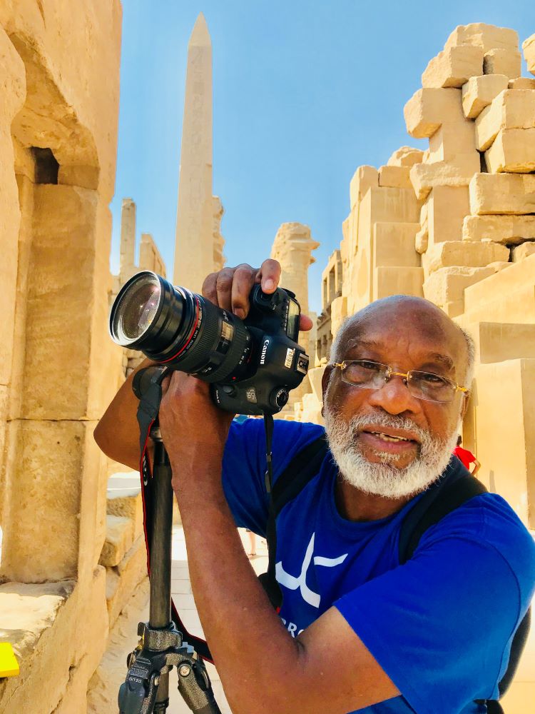 Chester Higgins holding a camera