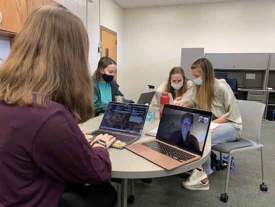 Group of undergraduate research assistants collaborating on a literature search