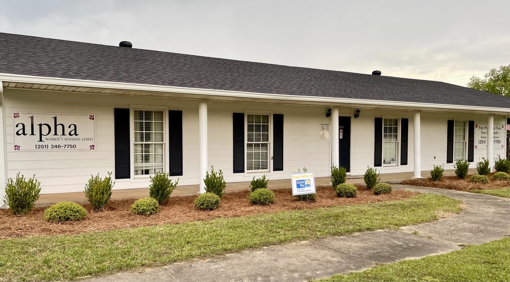 The Alpha center manicured with shrubs