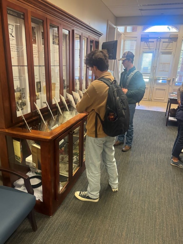 Aviation Leadership students reading Braveheart artist biographies