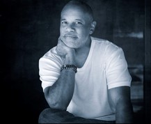 photo of a man in a white shirt