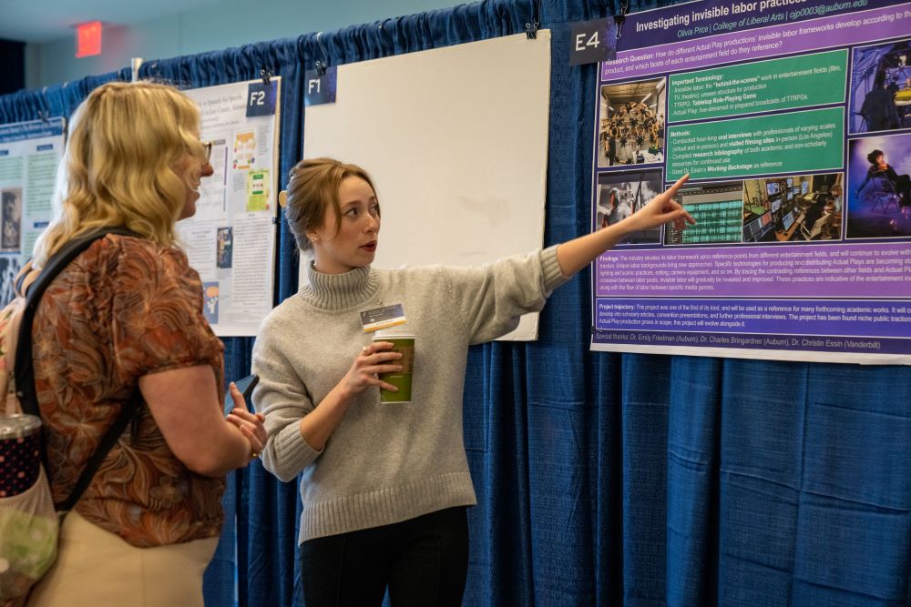 Olivia Price presents her research at the Student Research Symposium