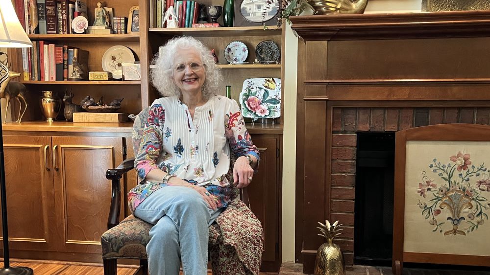 Kathy Bonner Herren sitting in her home