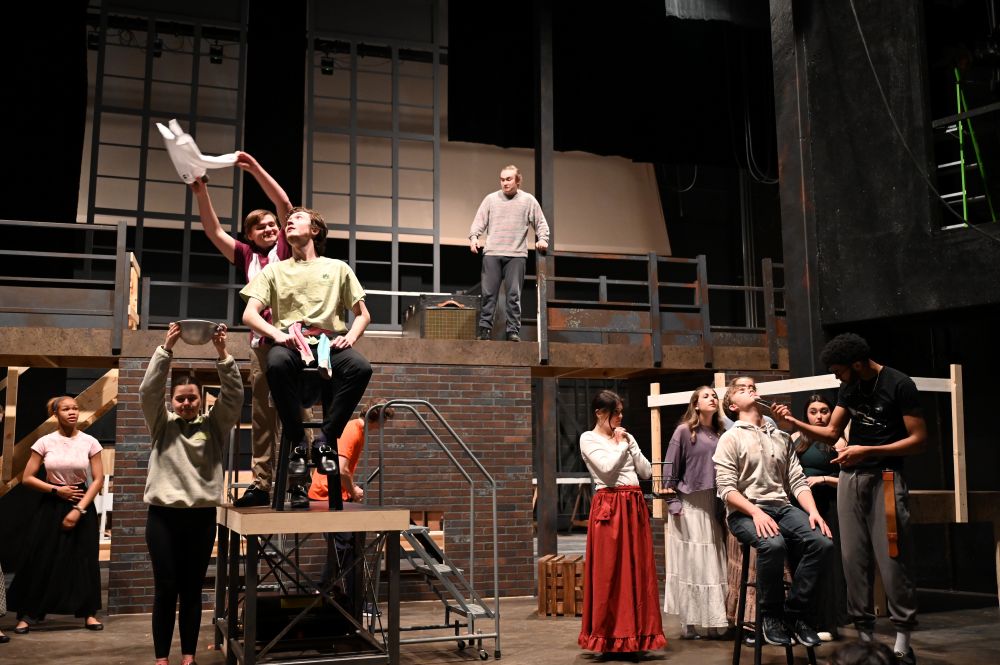 Student actors rehearsing a scene from Sweeney Todd