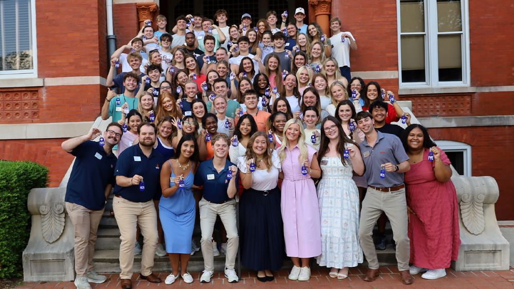 Camp War Eagle student leaders pose for a photo on the steps of Samford Hall