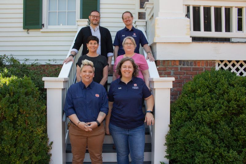 Anthropology faculty standing in a group on stairs