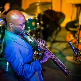 Khari Allen Lee playing a clarinet