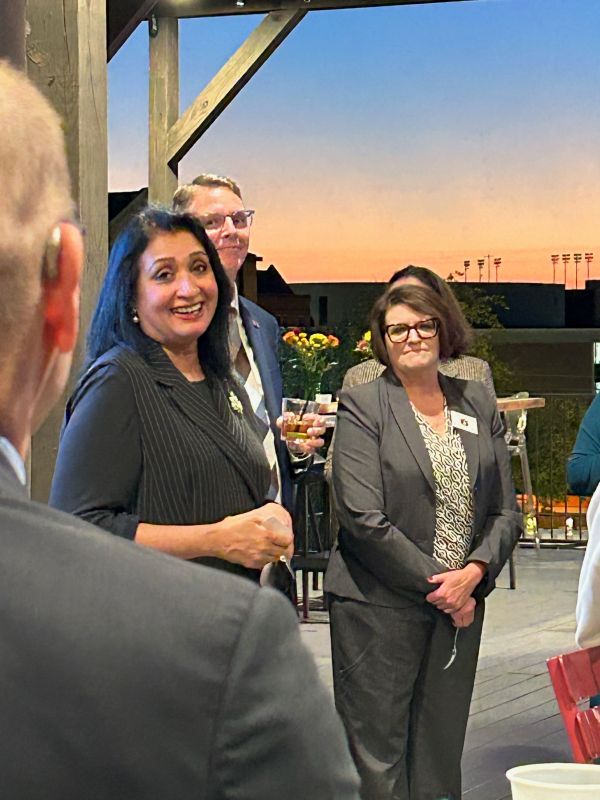 People standing  on a balcony