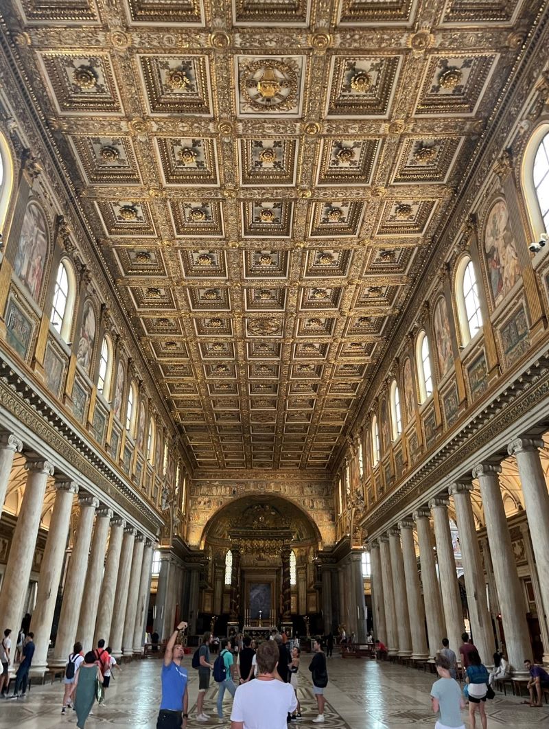 Museum entrance with gold ceiling and columns