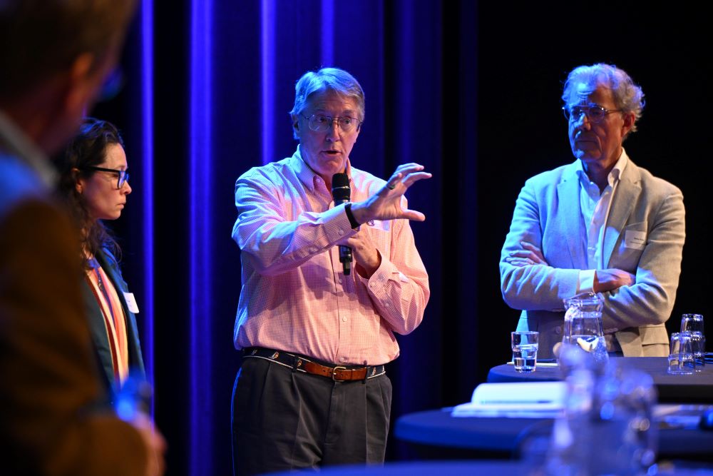 John Morris speaking during a panel at the University of Twente