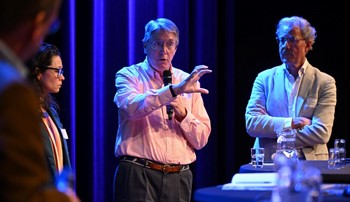 John Morris speaking during a panel at the University of Twente
