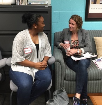 Student and Teacher talking 