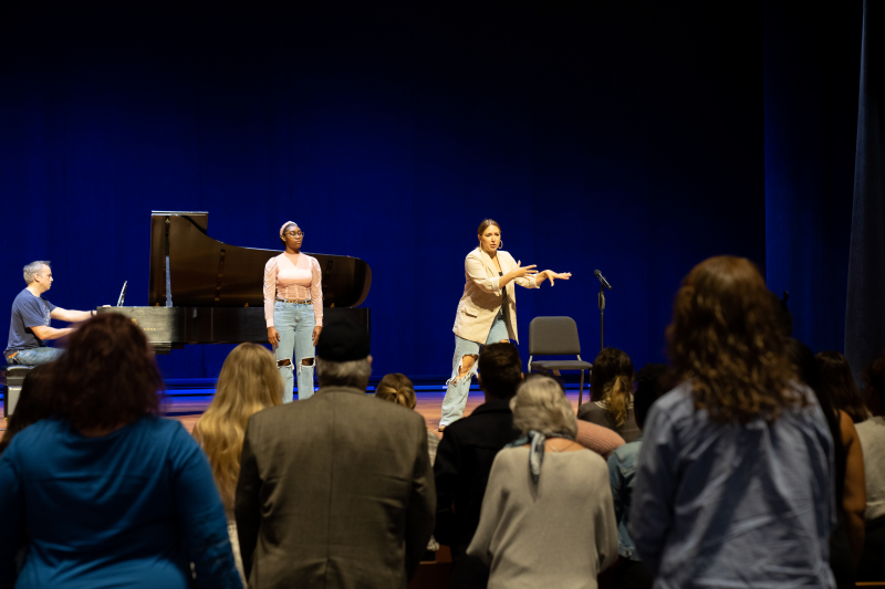 Jessica Vosk on stage speaking to theatre students