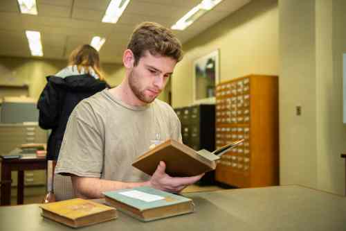 Student reading a book