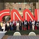 Group of students standing in front of CNN sign