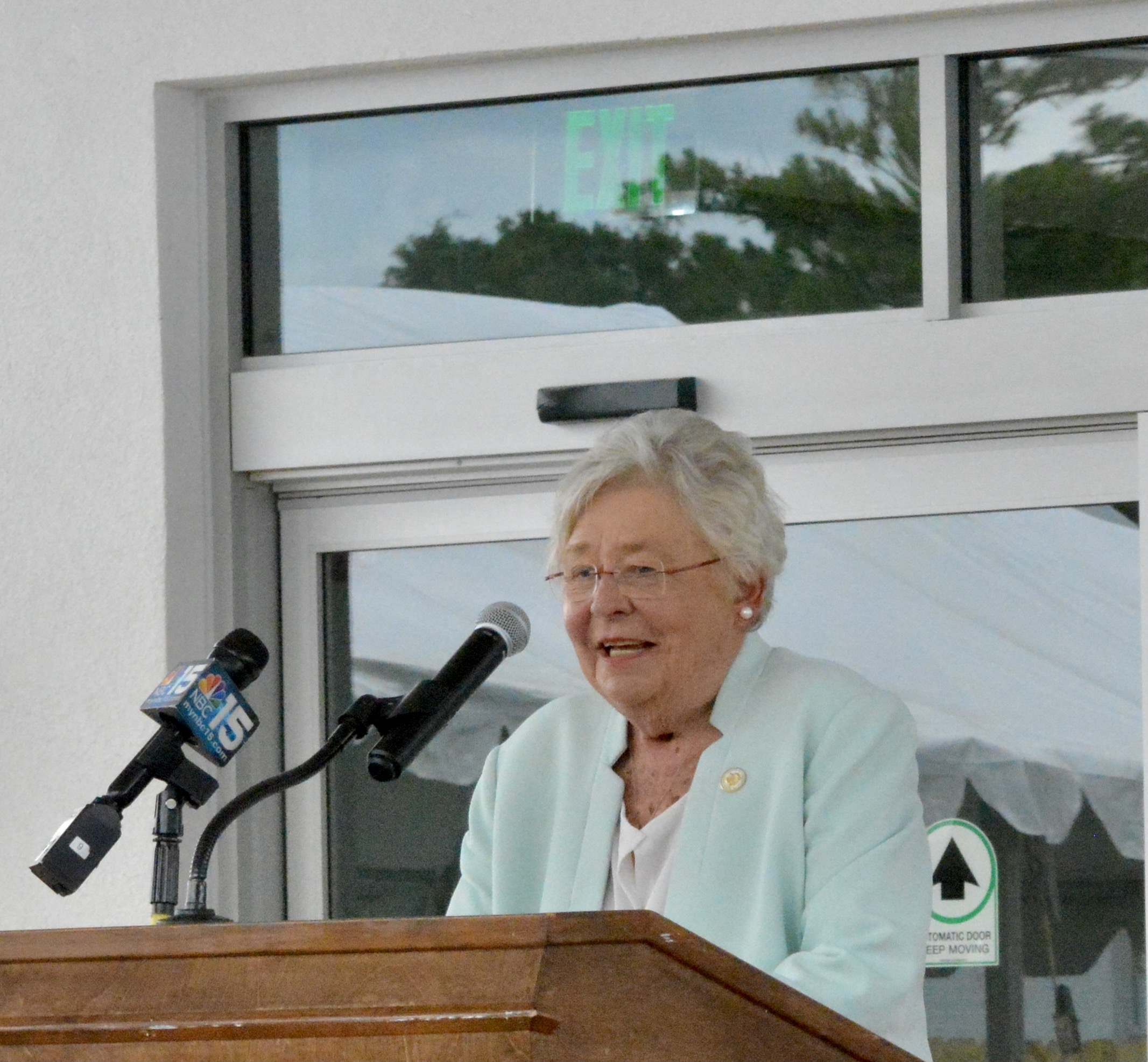 Gov. Ivey speaking at podium