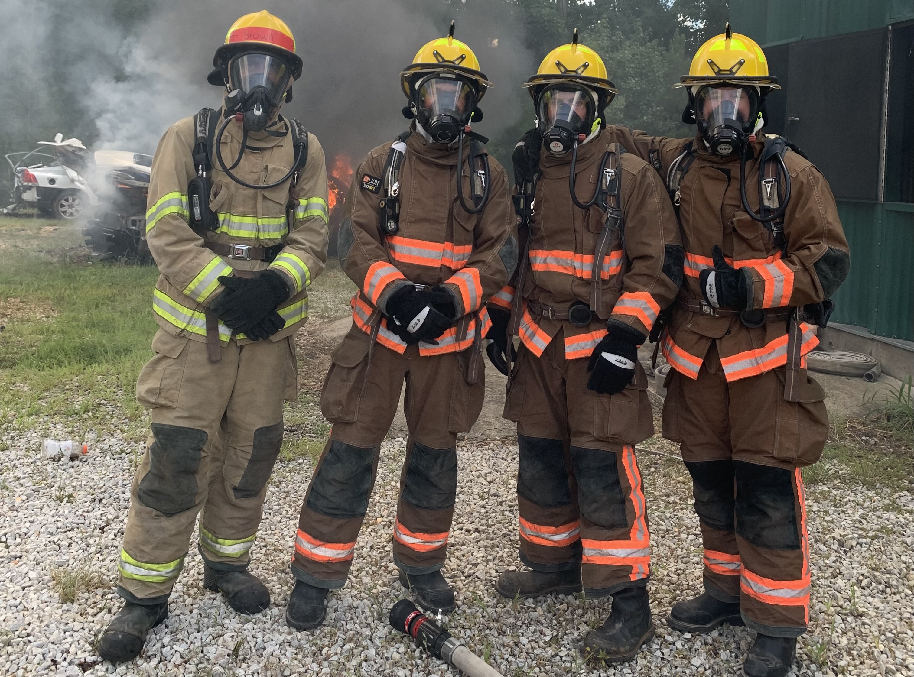 zack melton in uniform with other firefighters