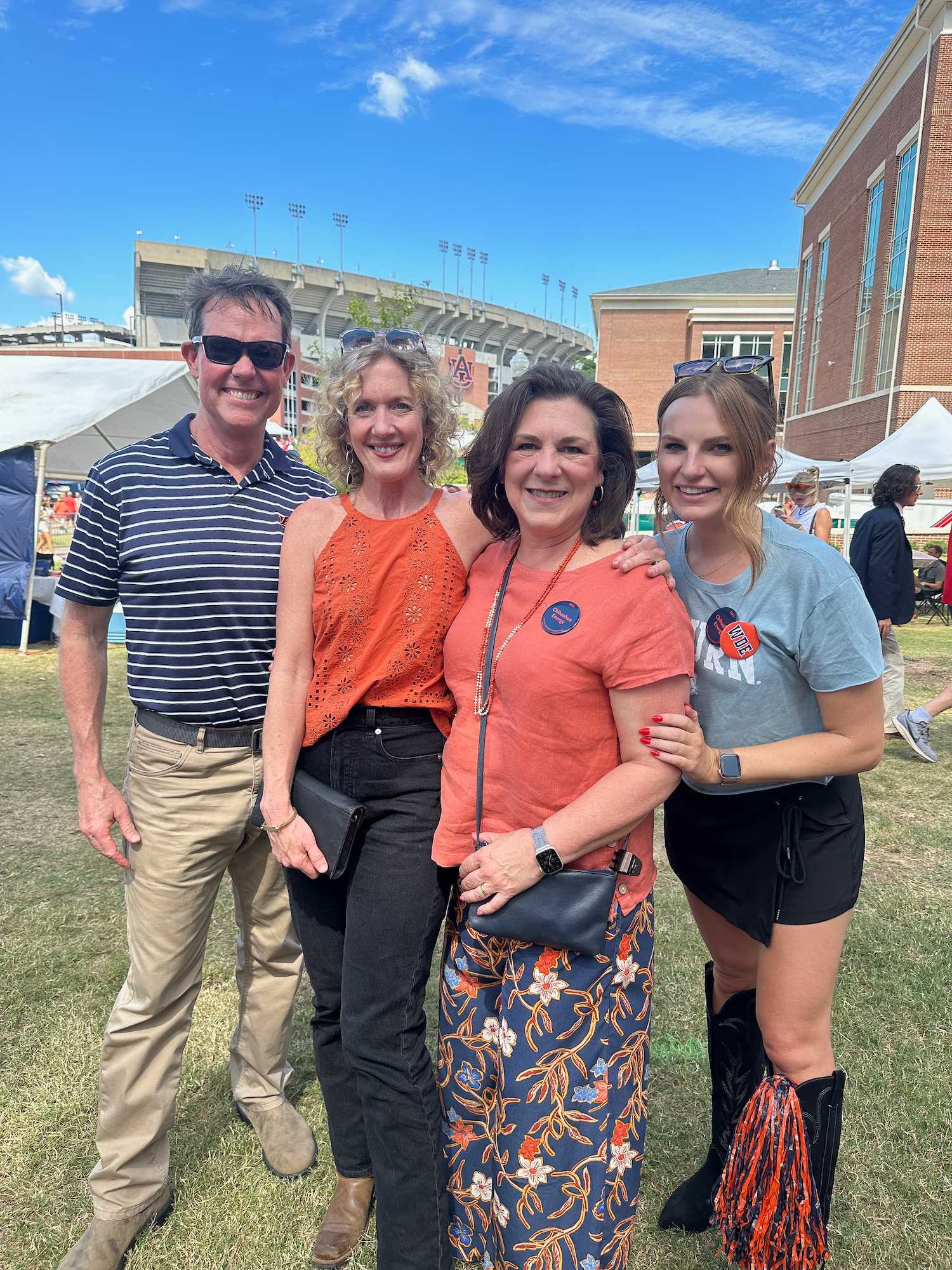 alumni and faculty at tailgate