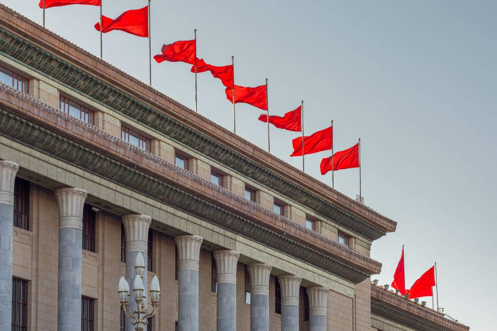Red banners atop the National People's Congress in Beijing, China