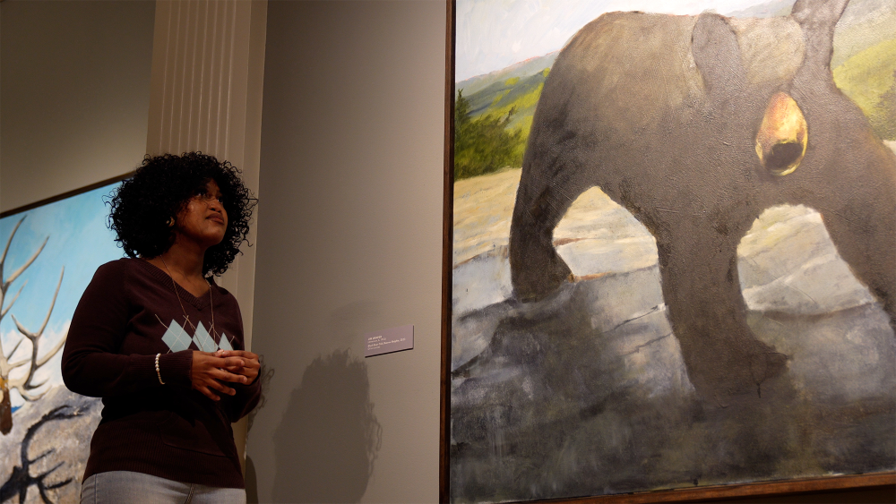 Precious Roberts-Miller guides a museum tour