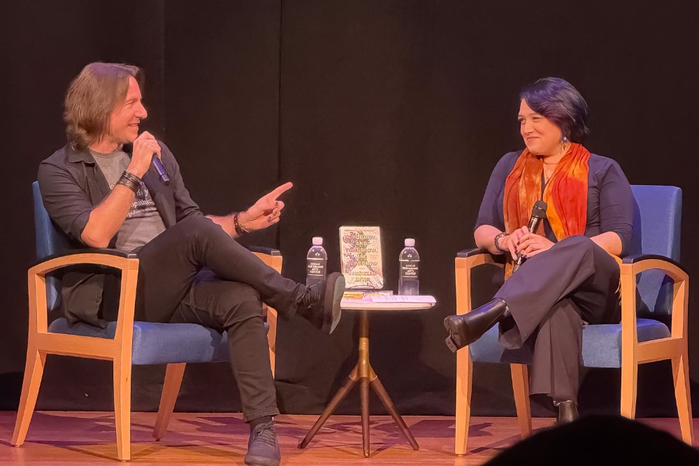 Matthew Mercer and Emily Friedman speaking on stage