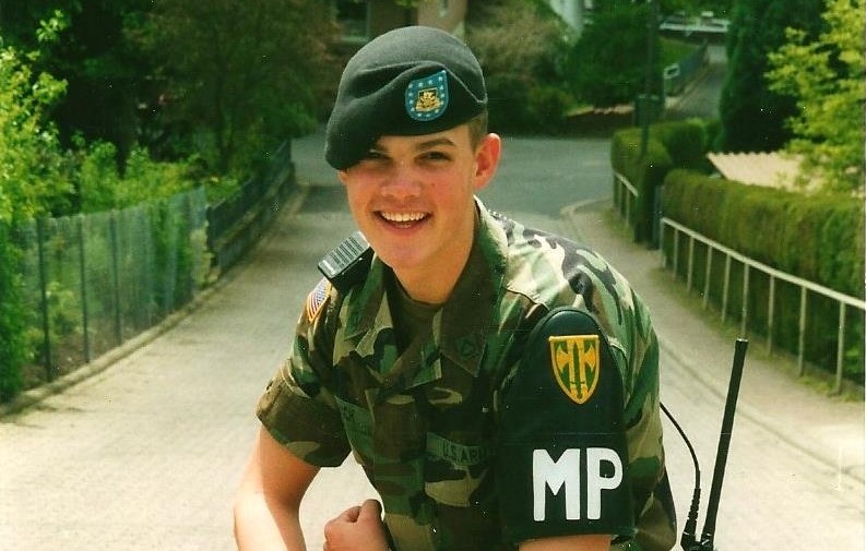 Todd Rauch in his military police uniform at 19 years old