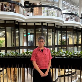 Arianne Gaetano standing in a lobby in a building in Singapore