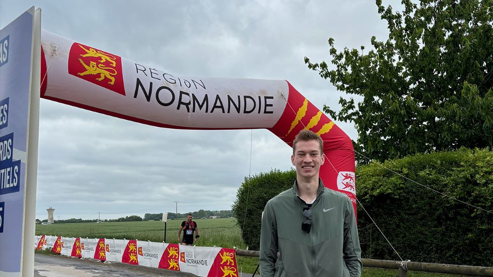 Ethan Davis at the finish line of the Normandy Running Festival