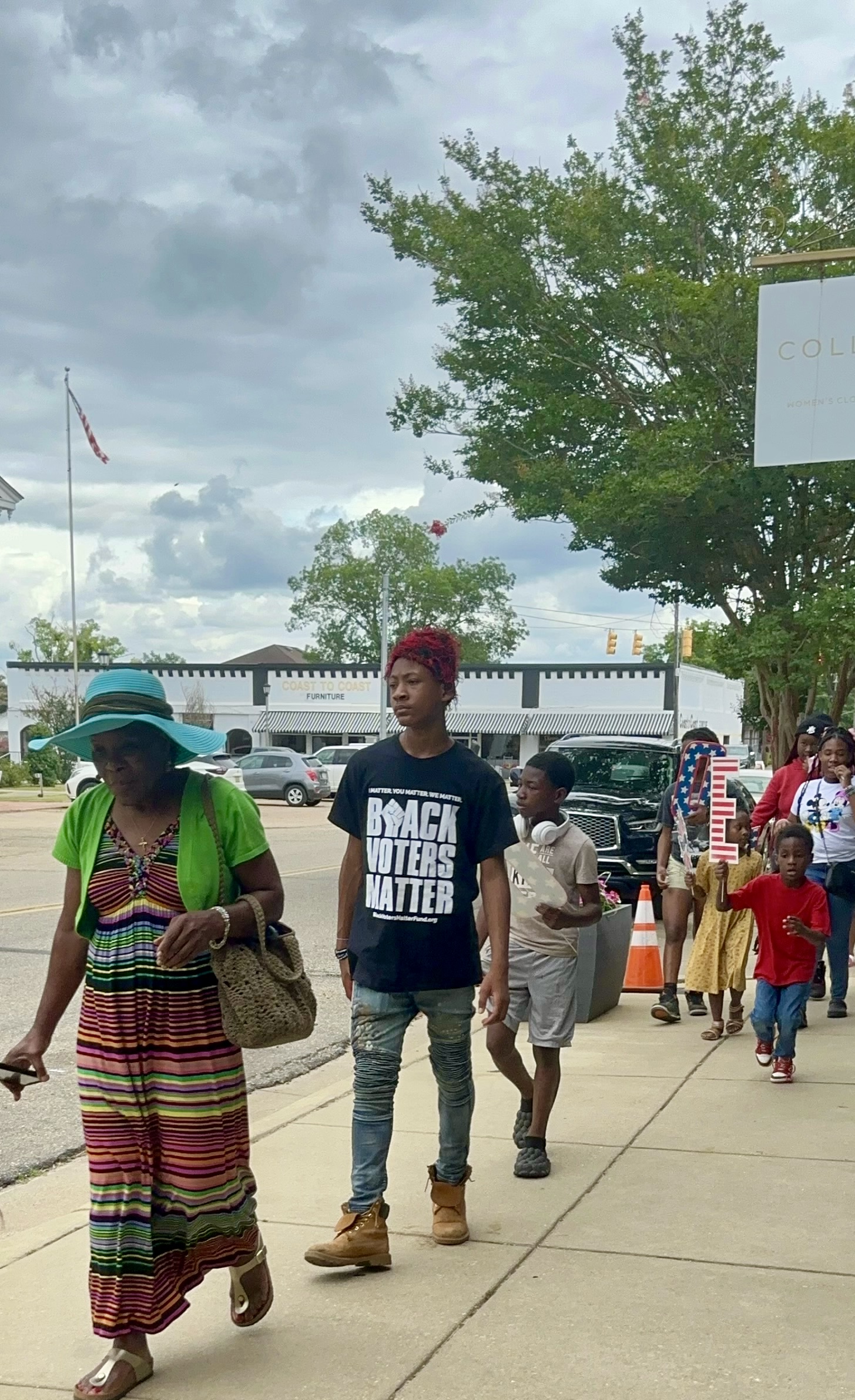 Community members take part in a Juneteenth parade in downtown Camden