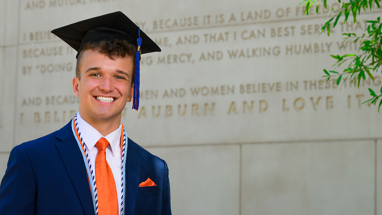 Vince Wolfram wearing a graduation cap