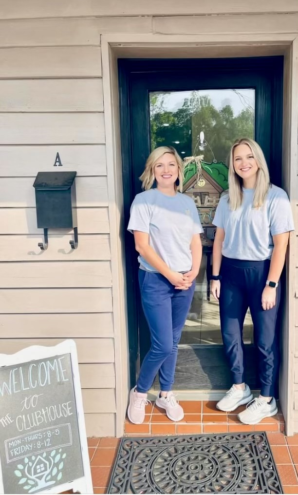 Jenna Savage and Savanna Williams, founders of The Clubhouse, stand outside the clinic.